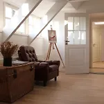 Cozy Penthouse Apartment In Tallinn Town Wall