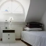 Cozy Penthouse Apartment In Tallinn Town Wall